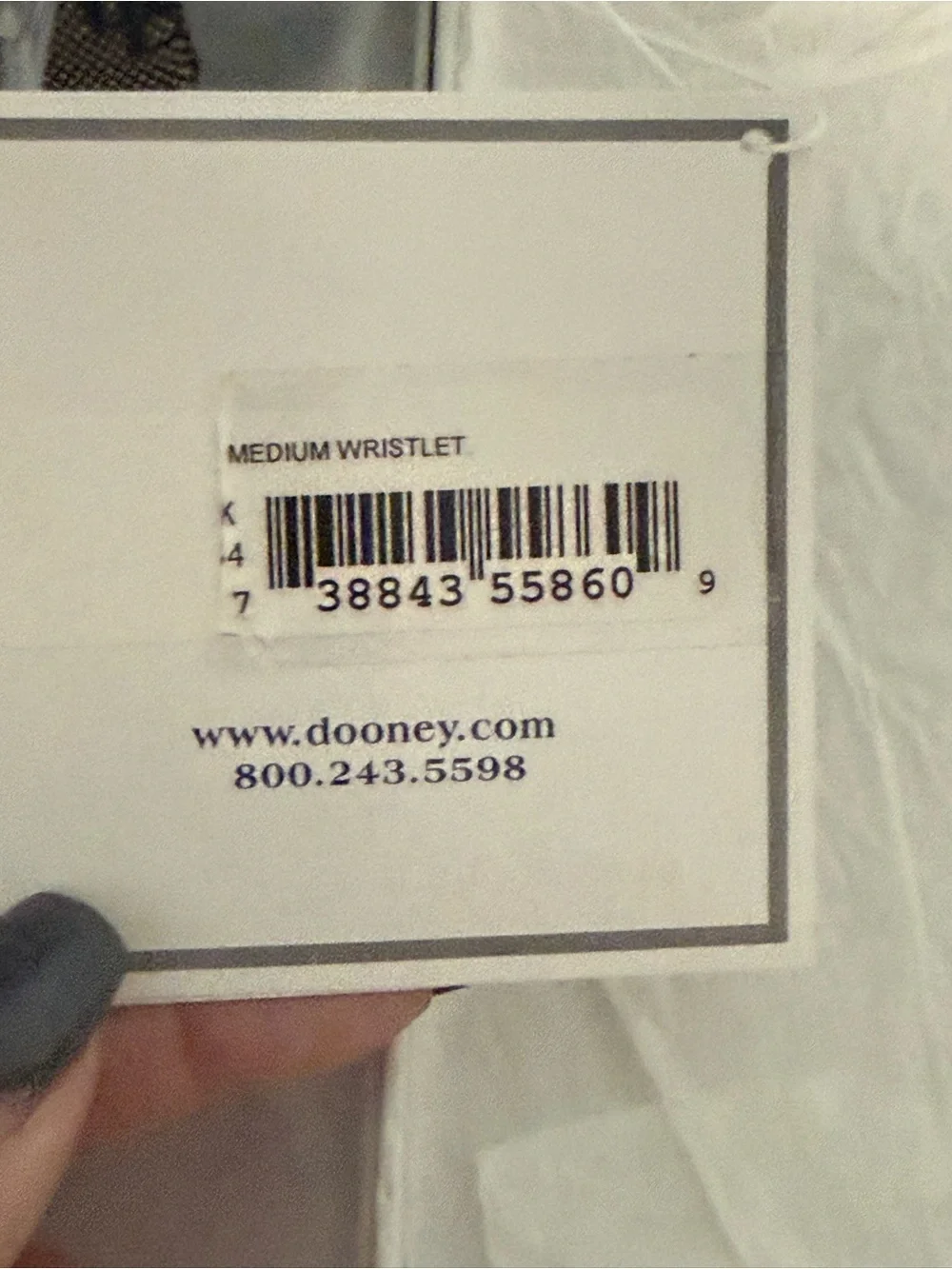 Dooney and Bourke NWT Medium logo wristlet. Comes in a box!